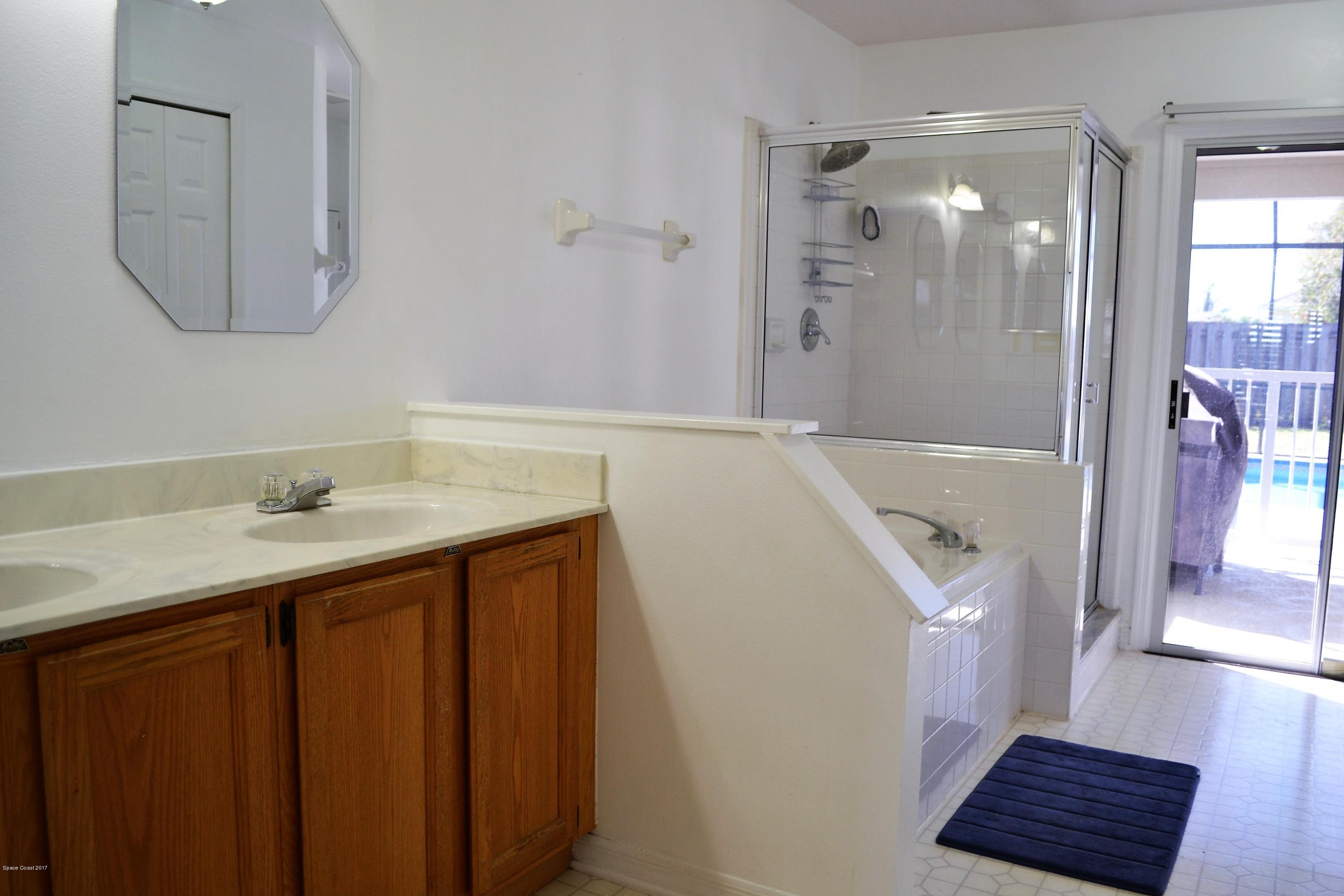 235 Twin Lakes Road Melbourne, FL 32901 - Photo 13 of 27 pool bath door