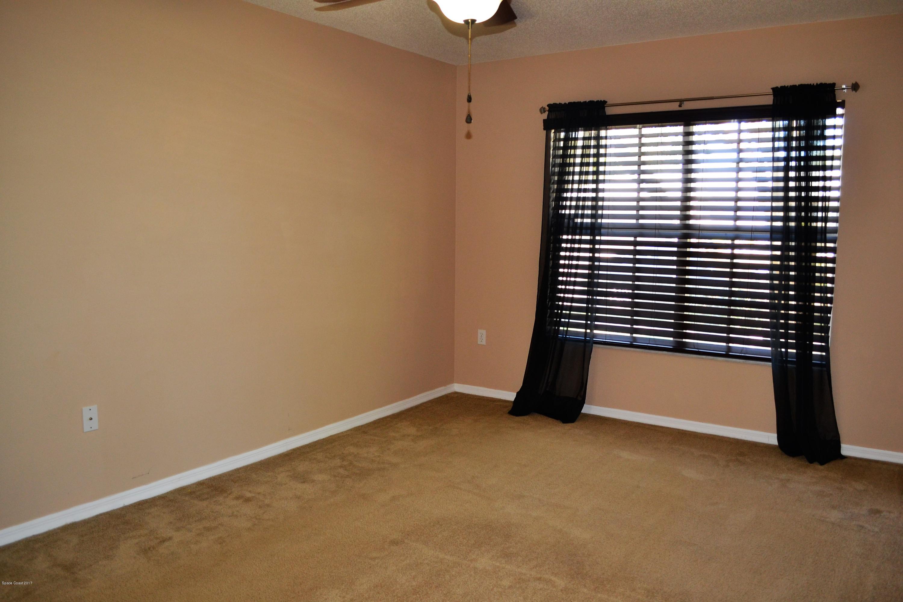 235 Twin Lakes Road Melbourne, FL 32901 - Photo 17 of 27 master bedroom
