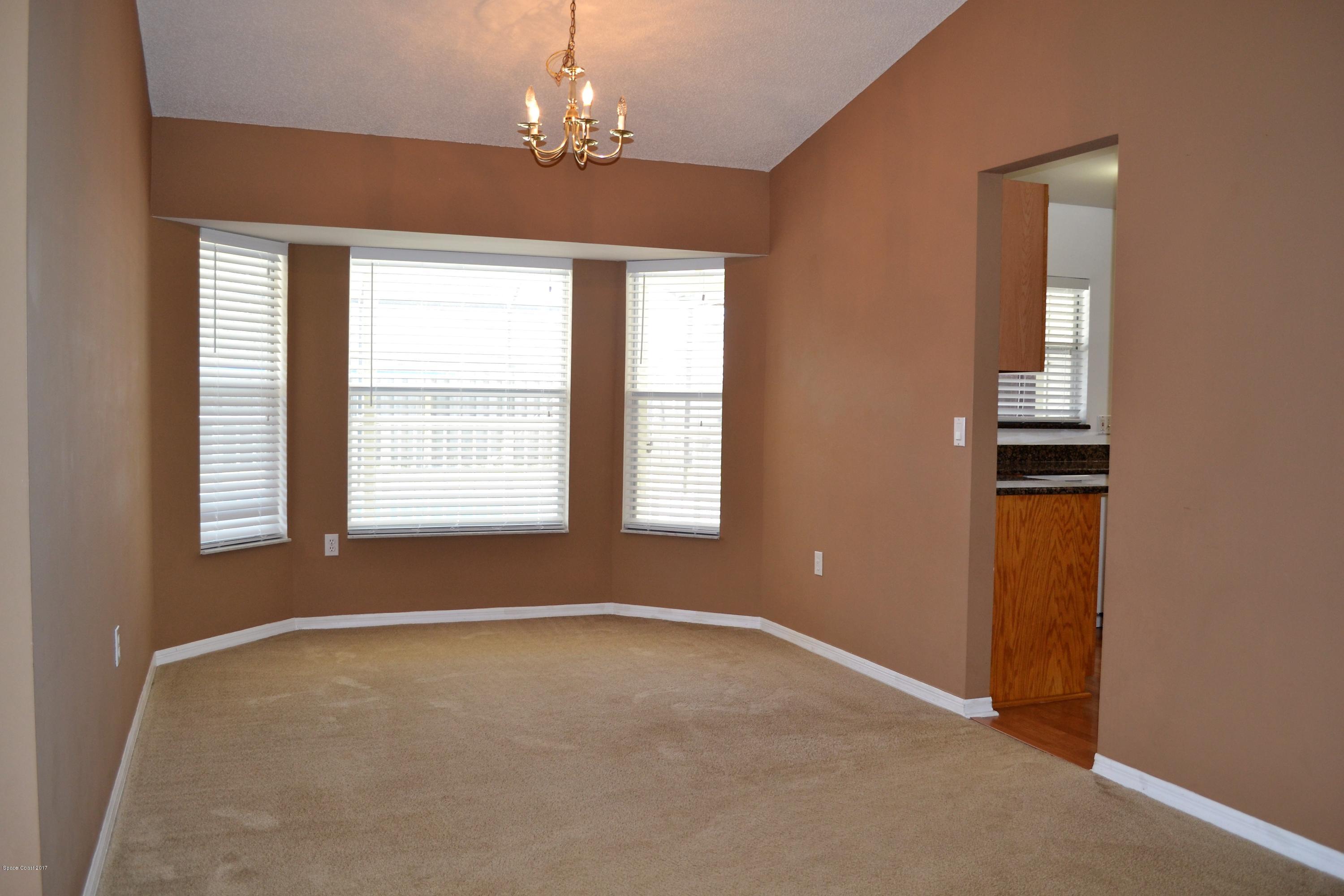 235 Twin Lakes Road Melbourne, FL 32901 - Photo 9 of 27 formal dining room