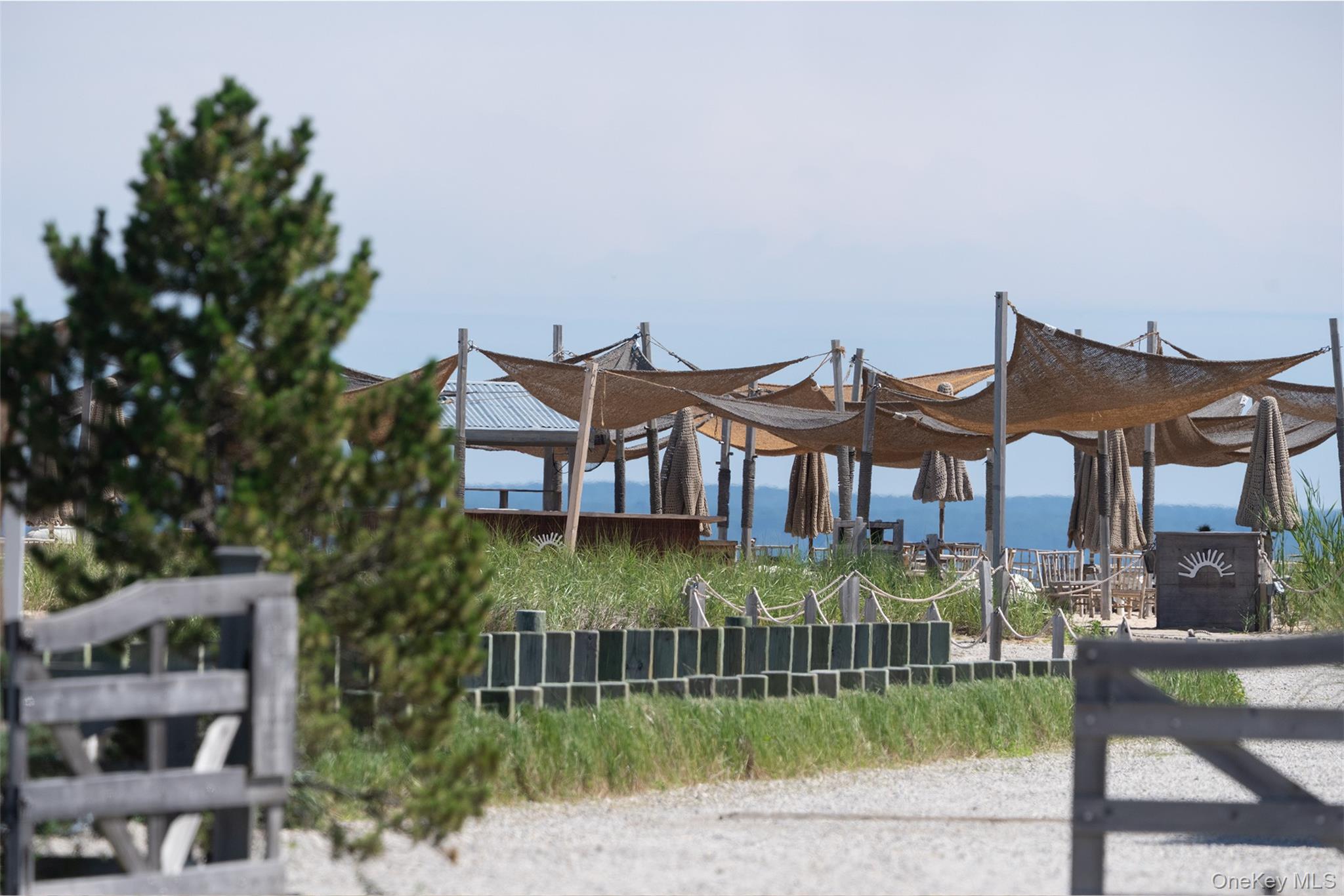 40495 Main Road Orient, NY 11957 - Photo 15 of 26 Duryea's outdoor dining with stunning views of the boats and beach lined shores across the street.