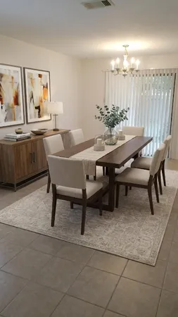a view of a dining room with furniture
