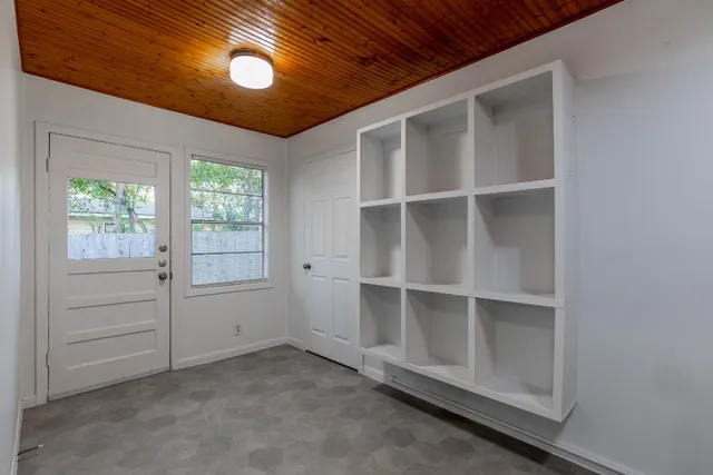 an empty room with windows