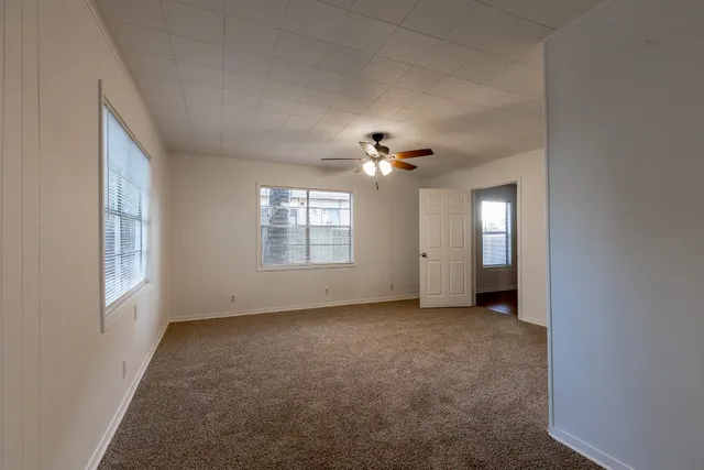 an empty room with windows