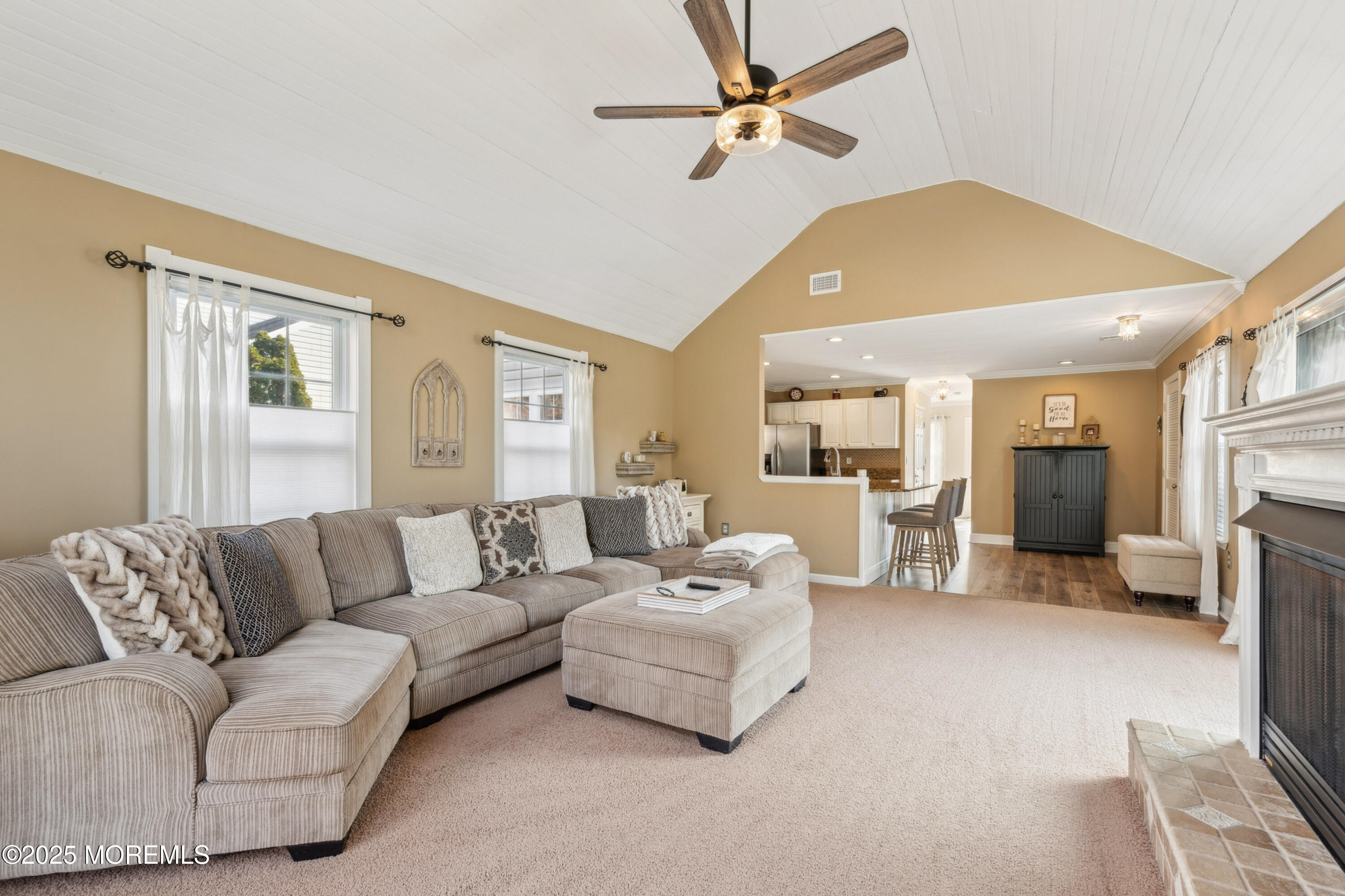 20 Capitol Reef Road Howell, NJ 07731 - Photo 20 of 38 a living room with furniture and a fireplace