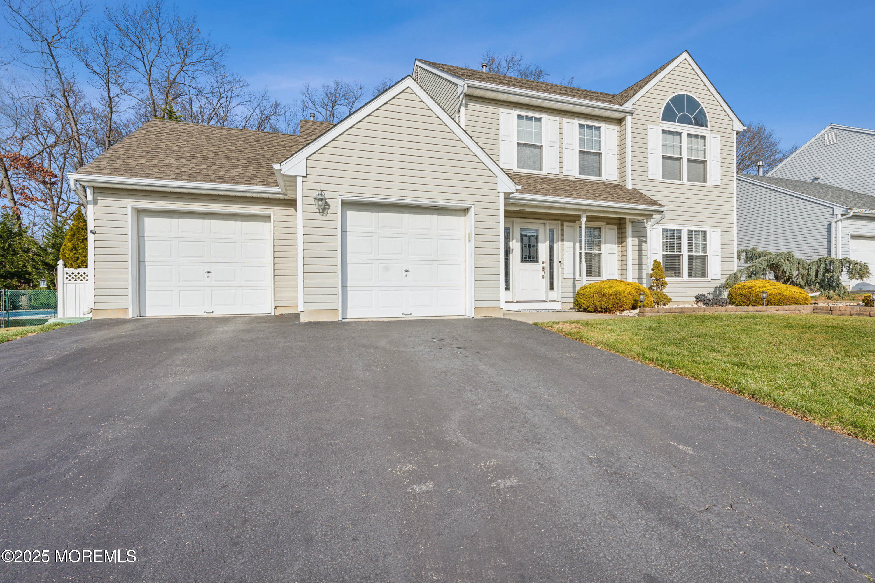 20 Capitol Reef Road Howell, NJ 07731 - Photo 2 of 38 a front view of a house with a yard