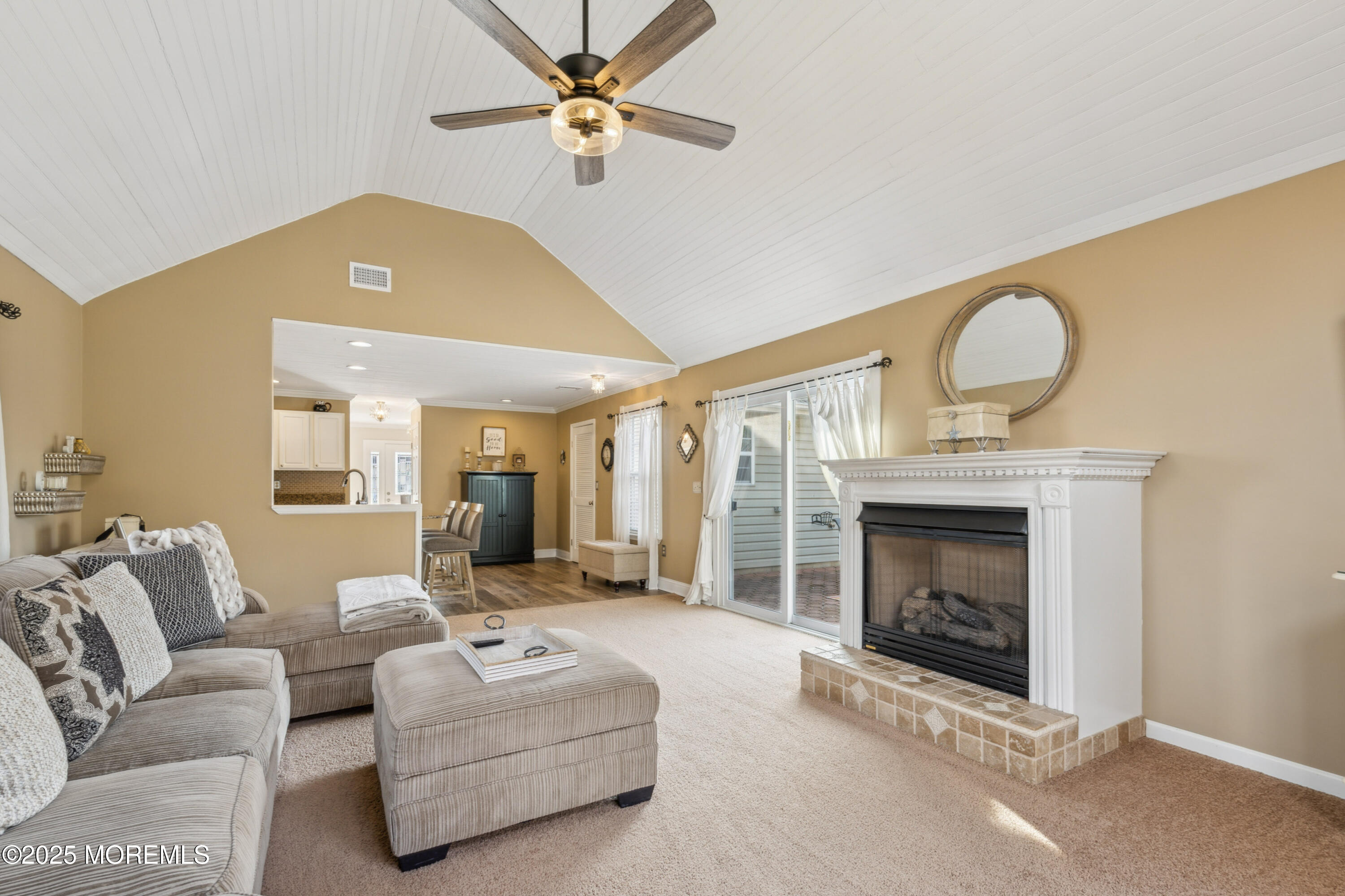 20 Capitol Reef Road Howell, NJ 07731 - Photo 21 of 38 a living room with furniture and a fireplace