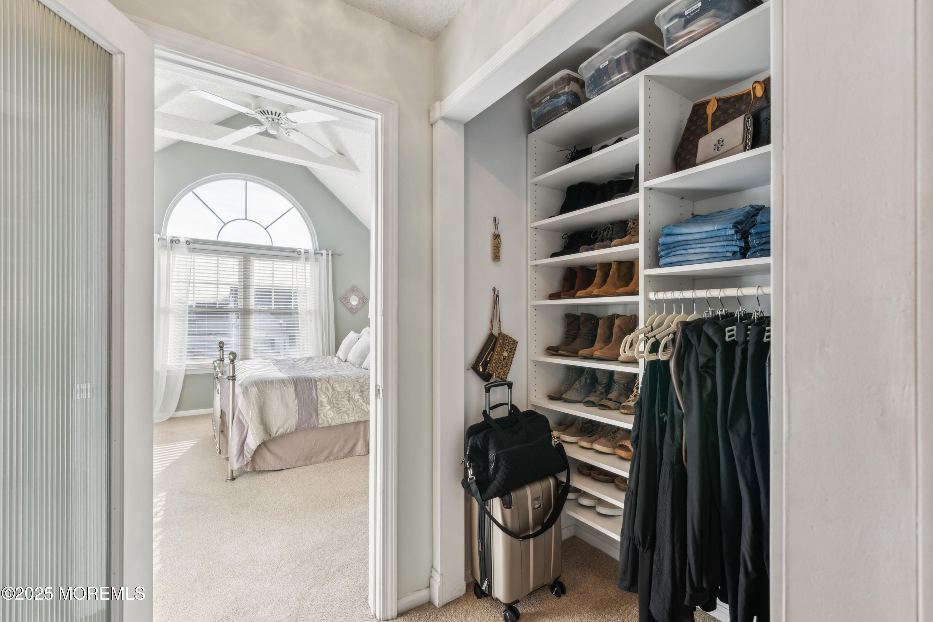 20 Capitol Reef Road Howell, NJ 07731 - Photo 29 of 38 a view of walk in closet with clothes and shoes