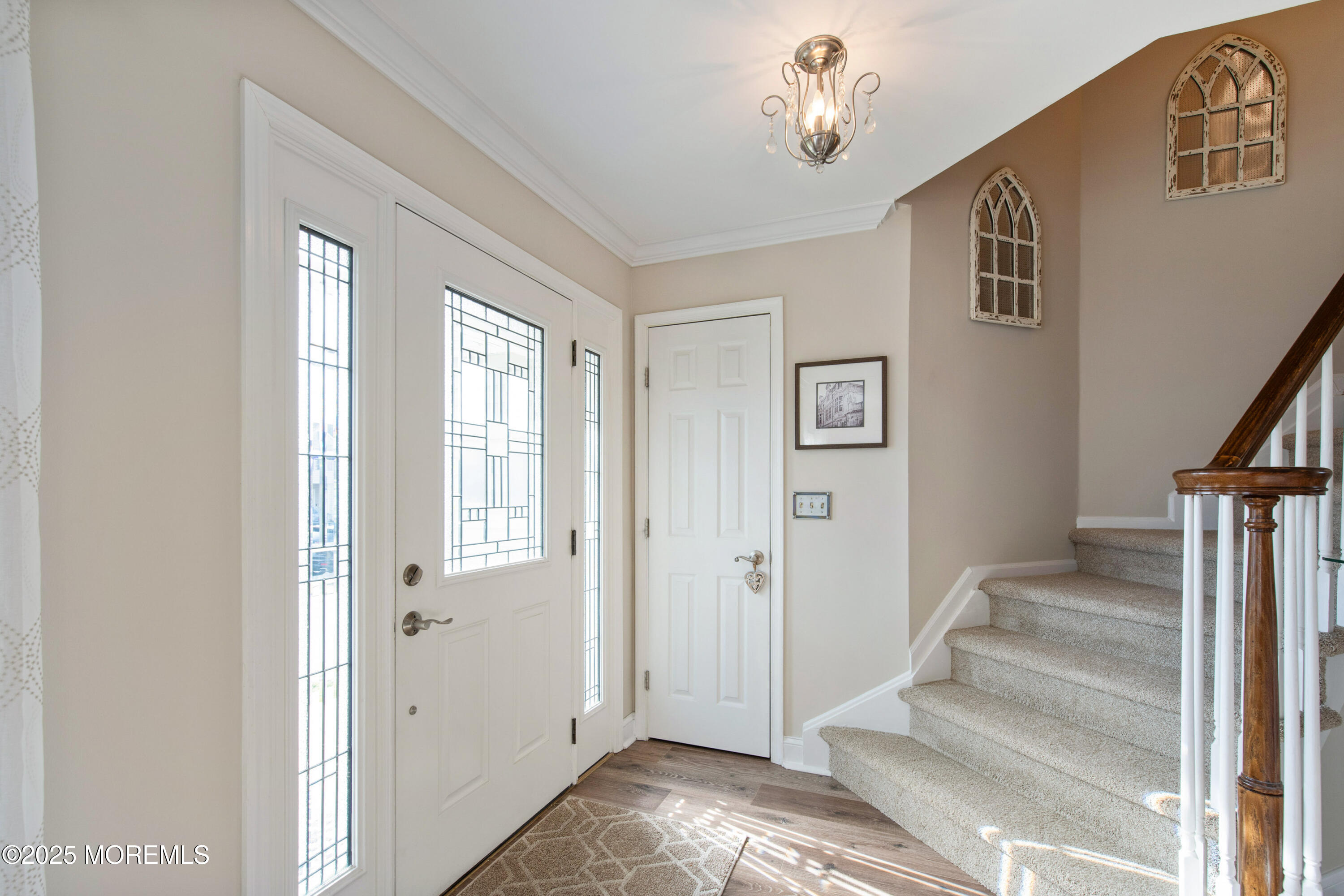 20 Capitol Reef Road Howell, NJ 07731 - Photo 5 of 38 a view of an entryway with wooden floor