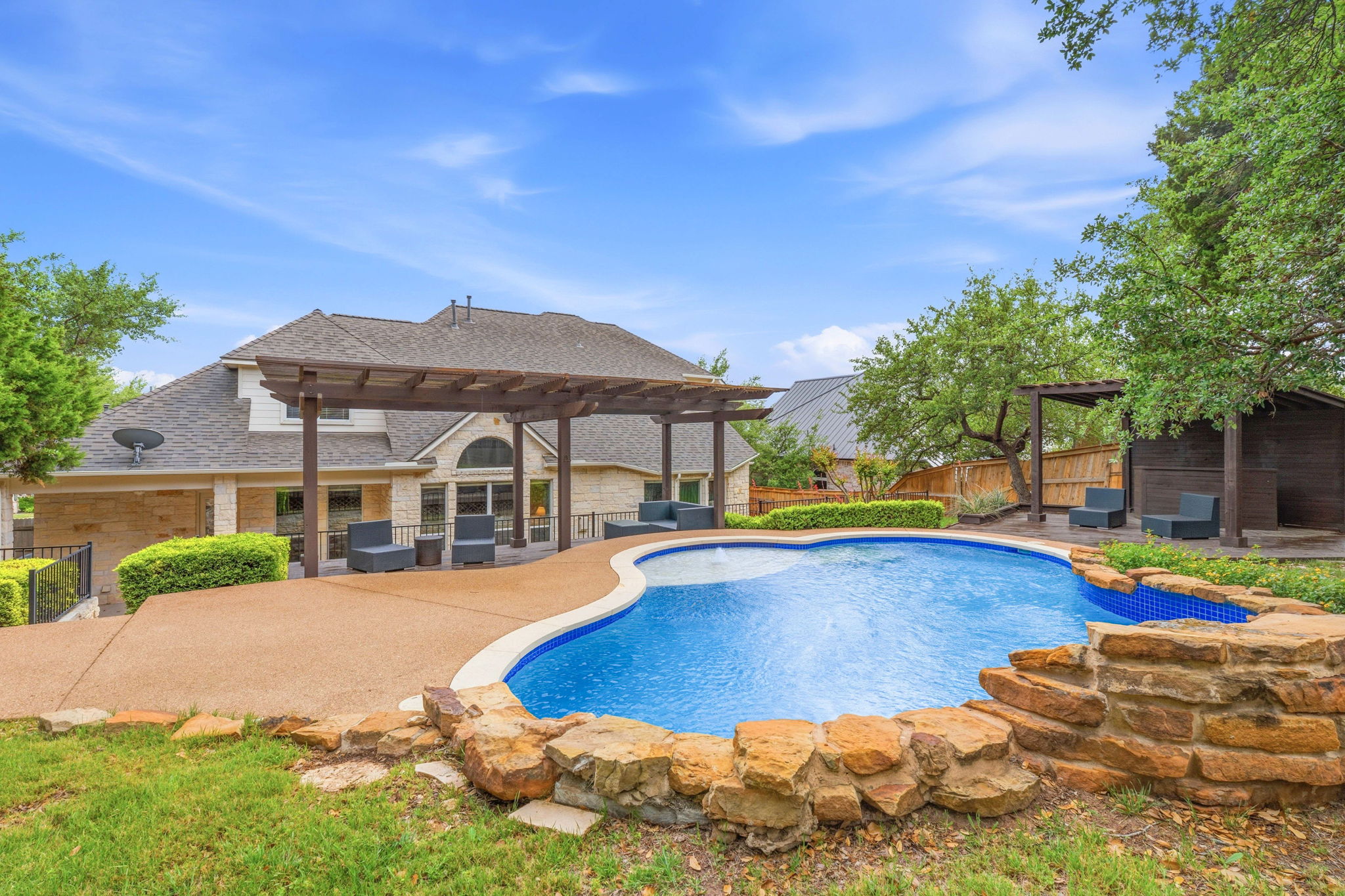 171 Brighton Lane Austin, TX 78737 - Photo 1 of 1 a view of a house with swimming pool and sitting area