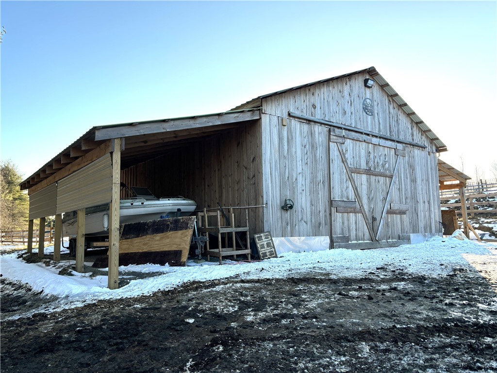 172 Hawks Road Pittsfield, NY 13411 - Photo 40 of 49 Barn has two outside overhangs