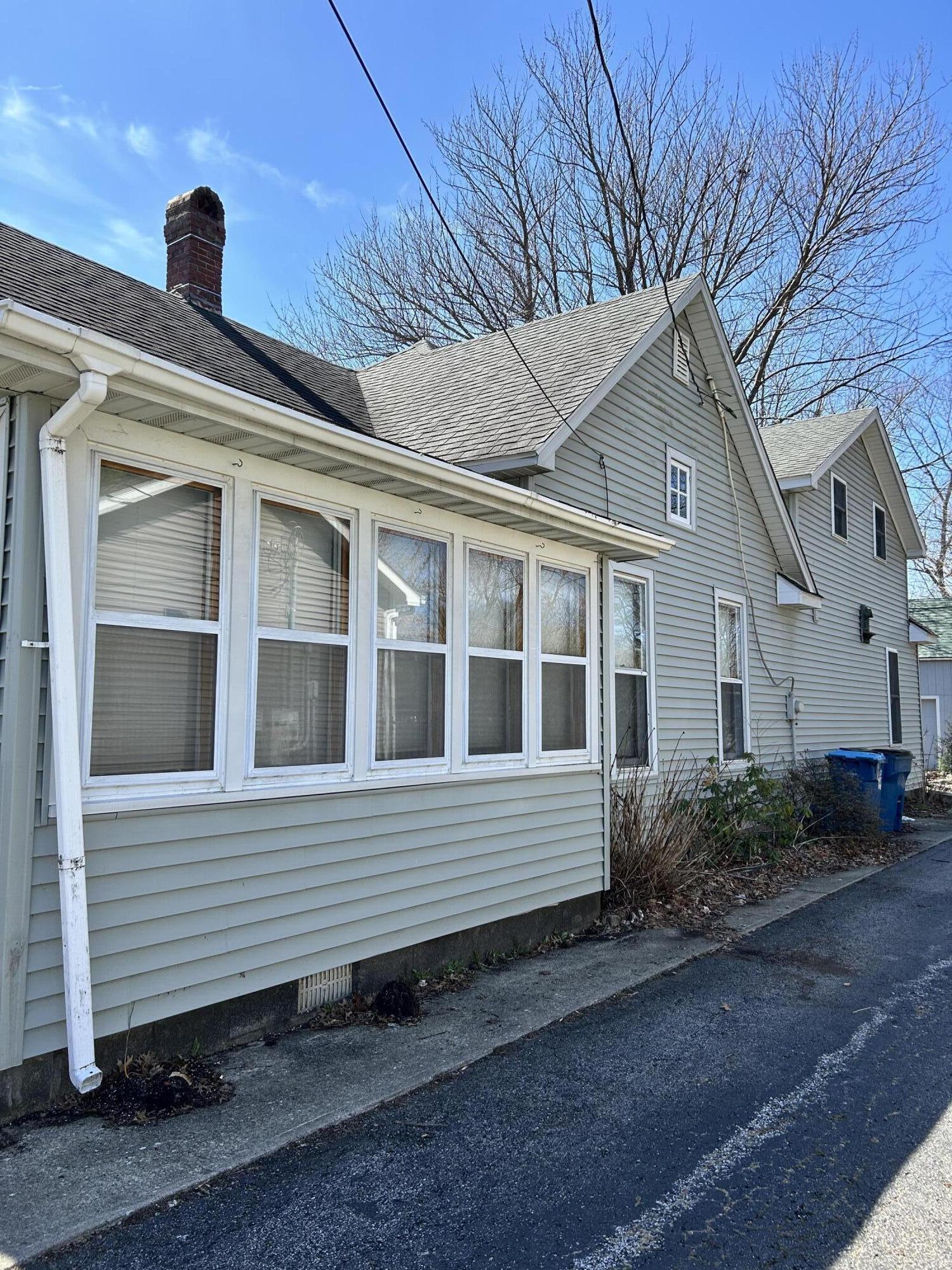 708 South Main Street Kouts, IN 46347 - Photo 2 of 22 a view of a house with a yard