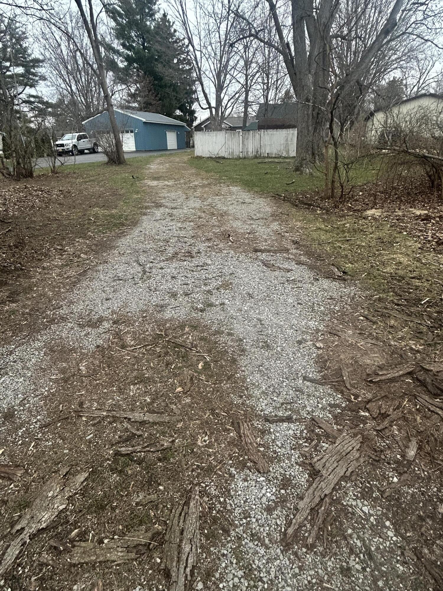 708 South Main Street Kouts, IN 46347 - Photo 22 of 22 a view of a yard with a house