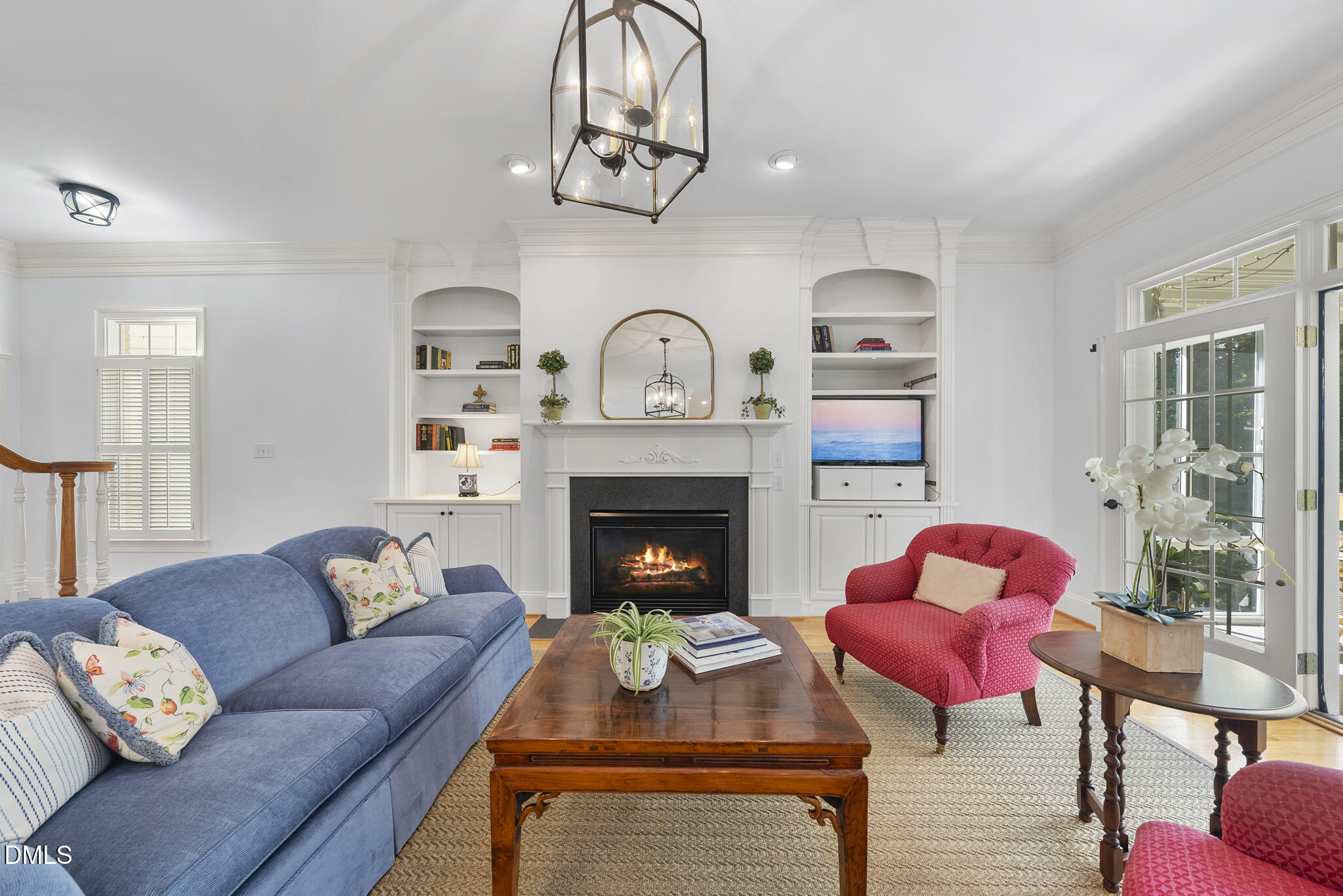 119 Faison Road Chapel Hill, NC 27517 - Photo 13 of 93 a living room with furniture and a fireplace