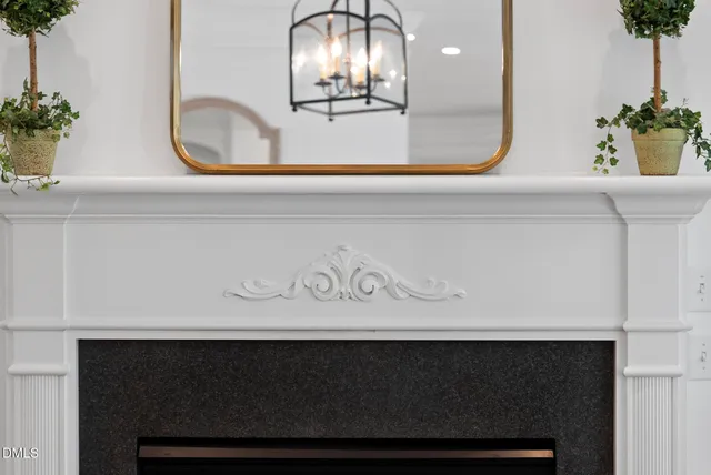 a bed room with a bed and a lamp