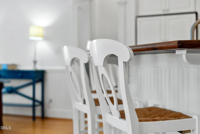 a bathroom with a sink double vanity granite tub and shower
