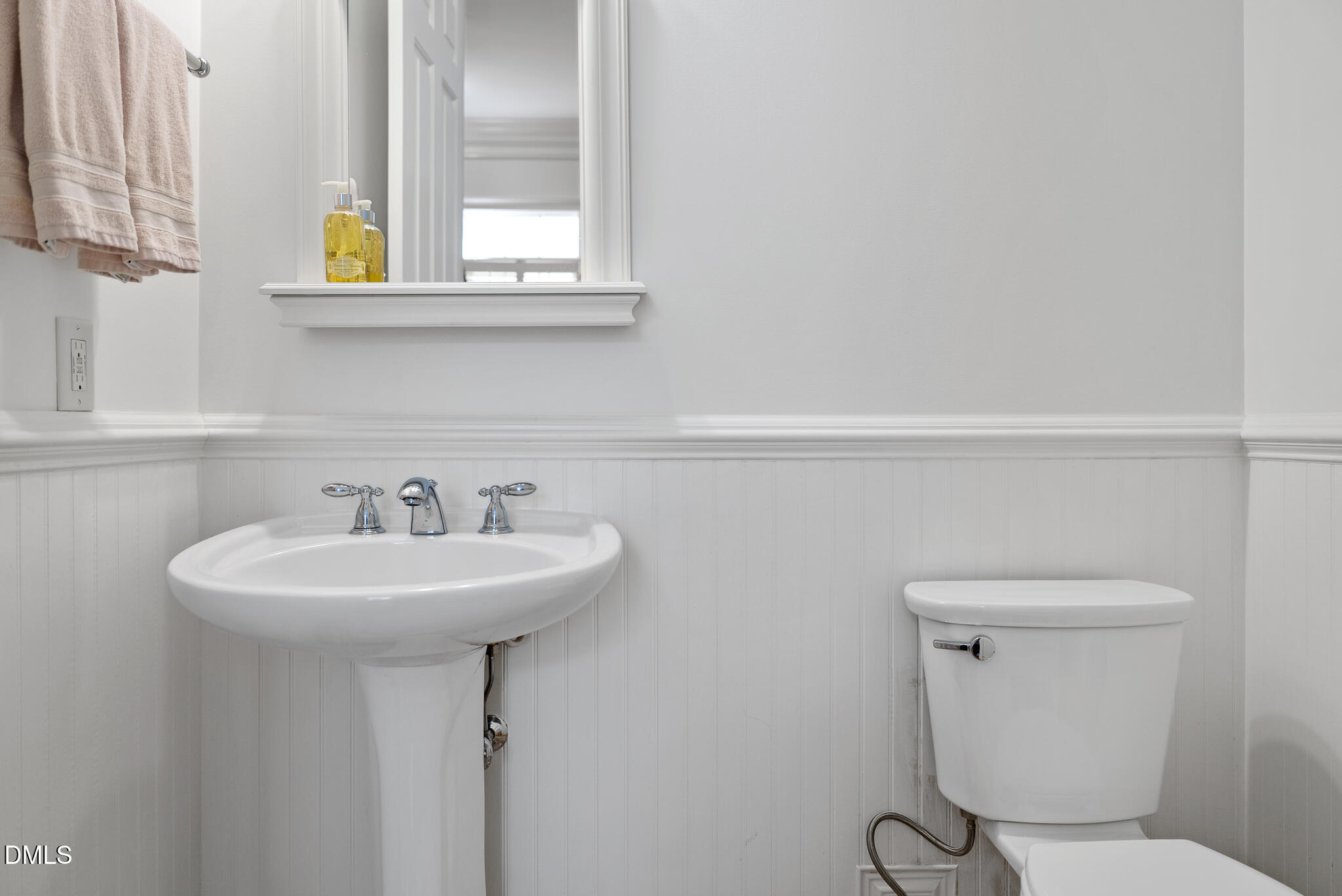 119 Faison Road Chapel Hill, NC 27517 - Photo 36 of 93 a bathroom with a sink a mirror and a toilet