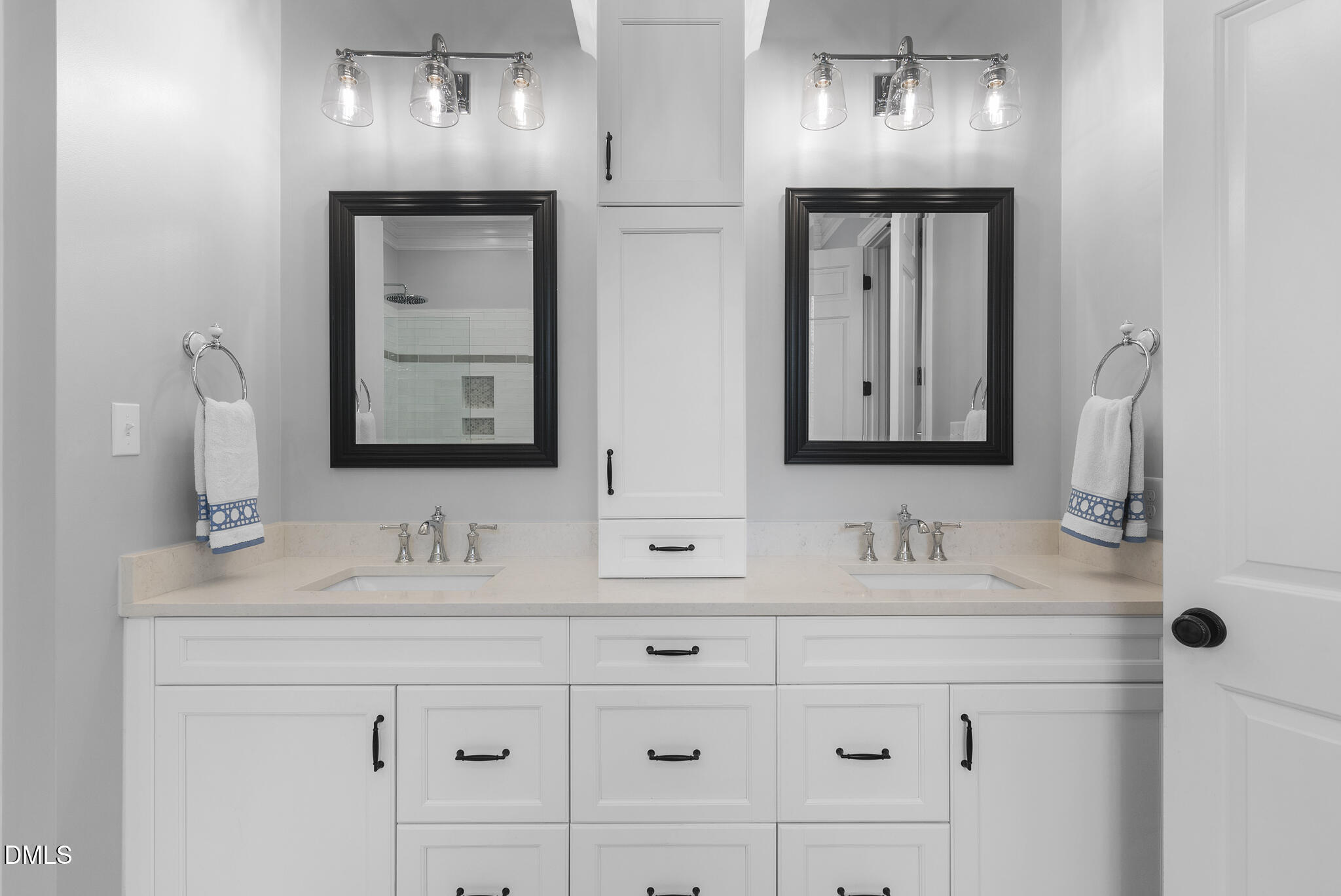119 Faison Road Chapel Hill, NC 27517 - Photo 42 of 93 a bathroom with double vanity sinks and a mirror