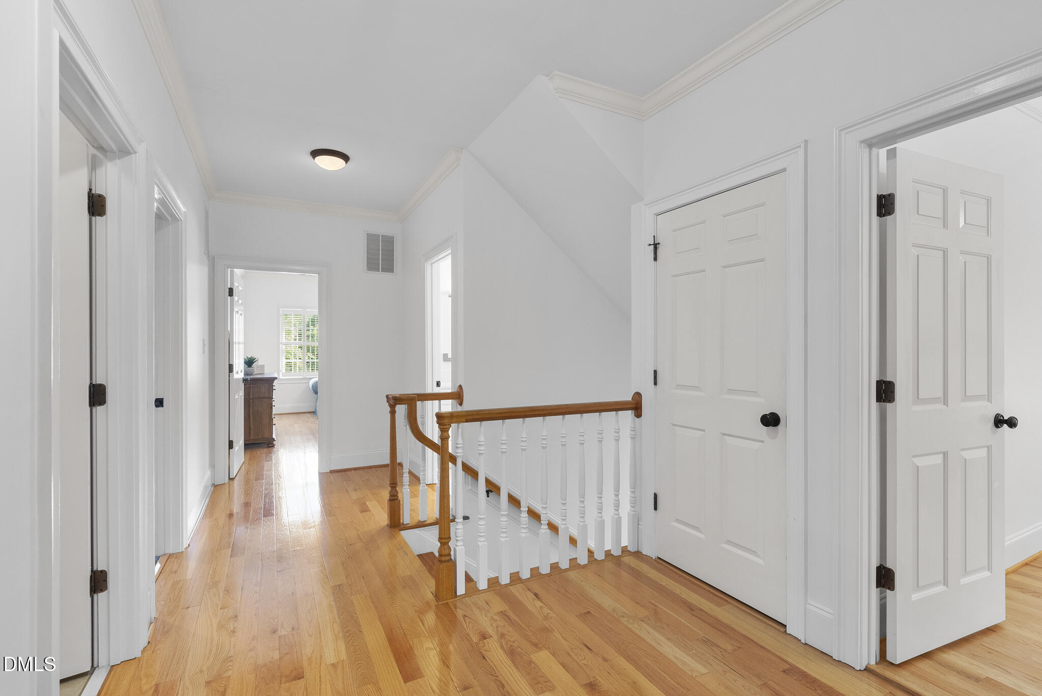119 Faison Road Chapel Hill, NC 27517 - Photo 45 of 93 a view of a hallway with wooden floor and staircase