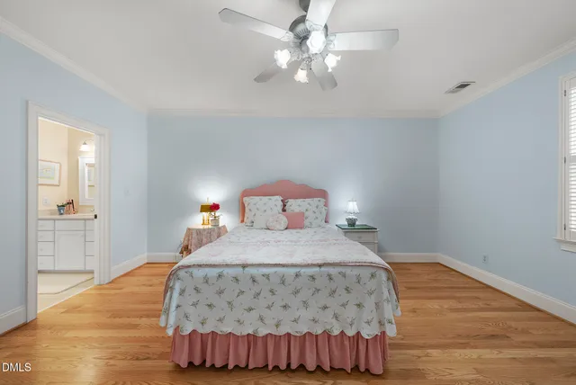 a view of a house next to a big yard