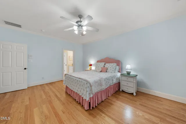 an aerial view of a house with pool outdoor seating and yard