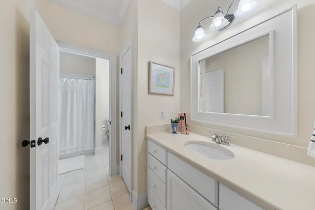 an aerial view of a houses with a yard