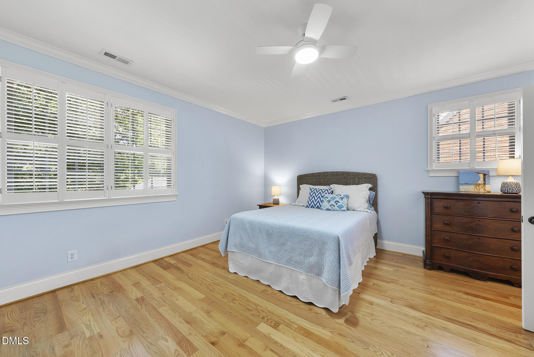 119 Faison Road Chapel Hill, NC 27517 - Photo 51 of 93 a bedroom with a bed and a dresser