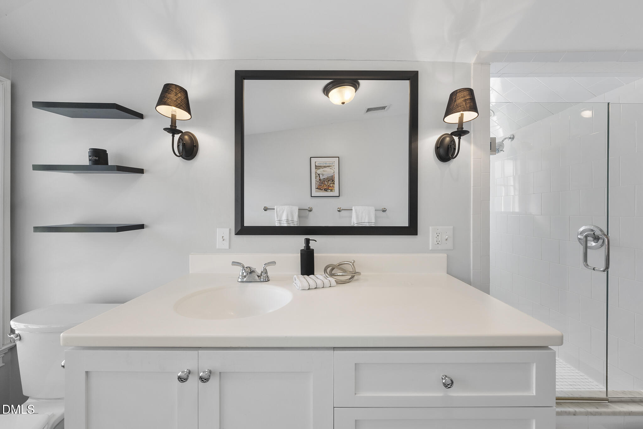 119 Faison Road Chapel Hill, NC 27517 - Photo 66 of 93 a bathroom with a sink and a mirror