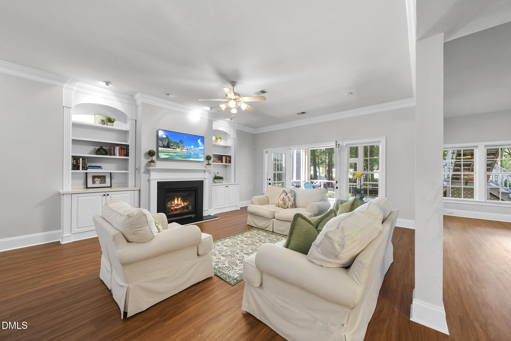 119 Faison Road Chapel Hill, NC 27517 - Photo 72 of 93 a living room with furniture a fireplace and a window