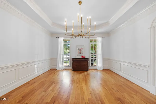 a living room with furniture and windows