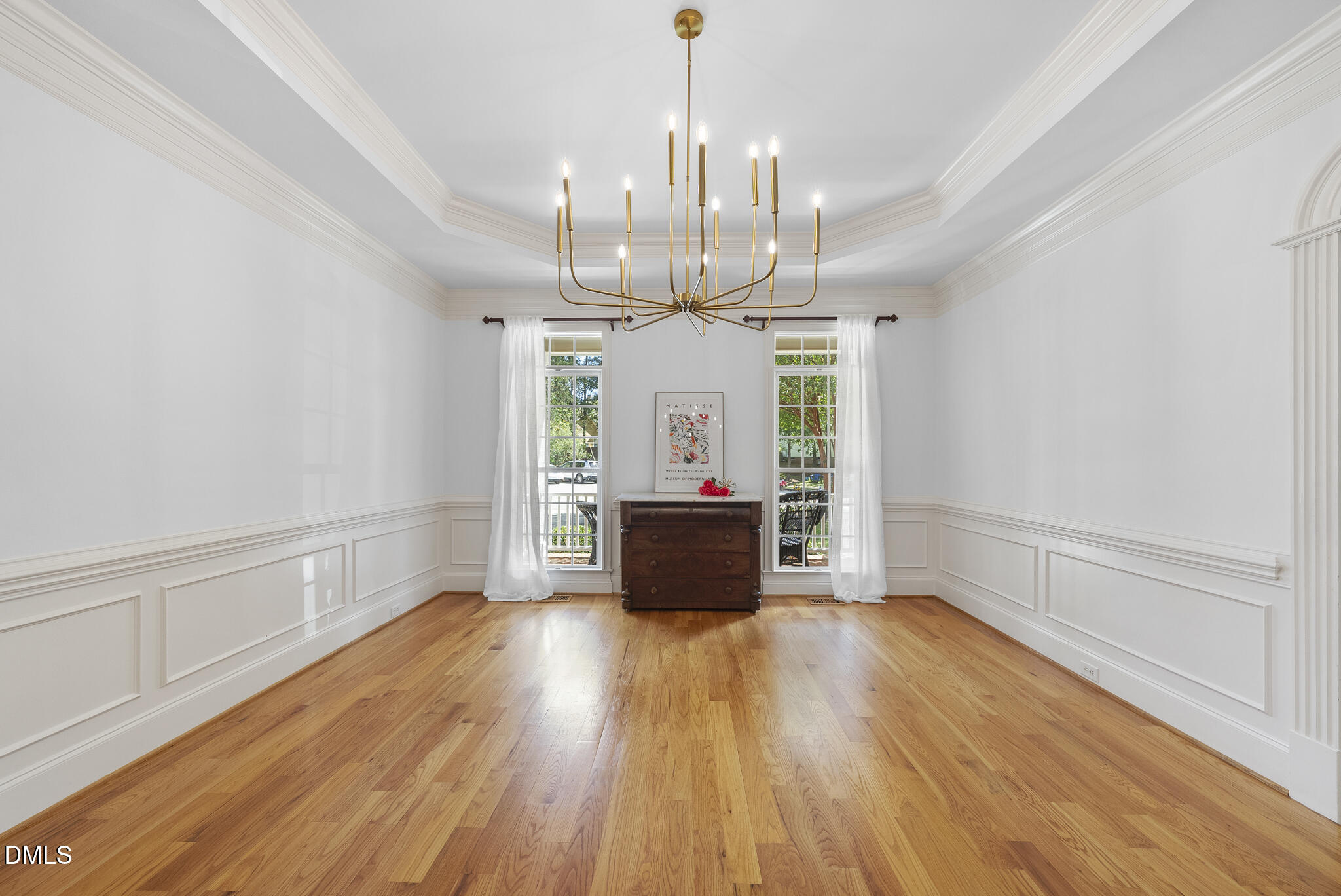119 Faison Road Chapel Hill, NC 27517 - Photo 9 of 93 a view of a room with wooden floor chandelier and entryway
