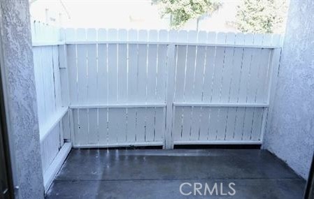 2255 Cahuilla Street, Unit 55 Colton, CA 92324 - Photo 5 of 6 a view of wooden cabinet