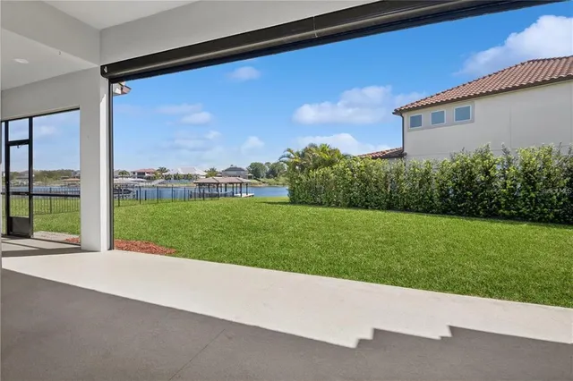 an empty room with closet and a bathroom
