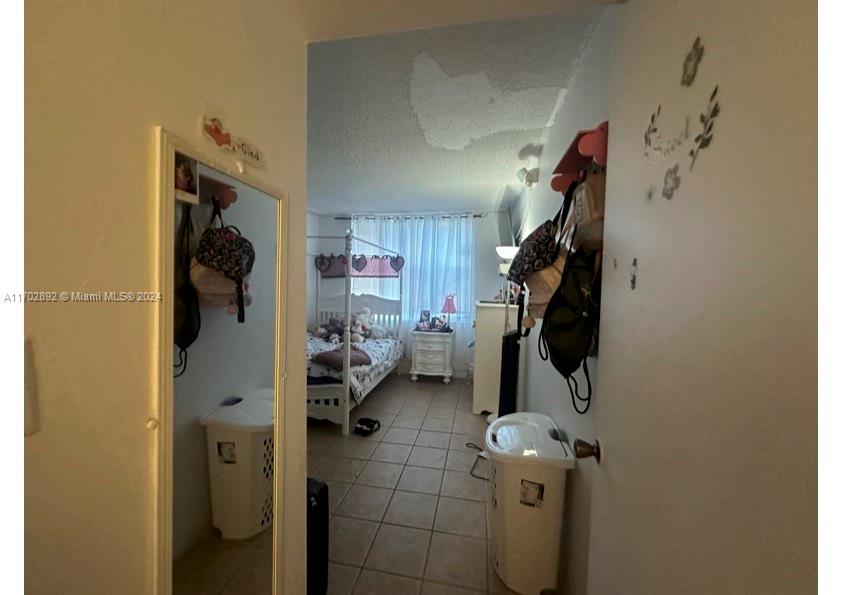 1800 Sans Souci Boulevard, Unit 239 North Miami, FL 33181 - Photo 14 of 15 a view of walk in closet