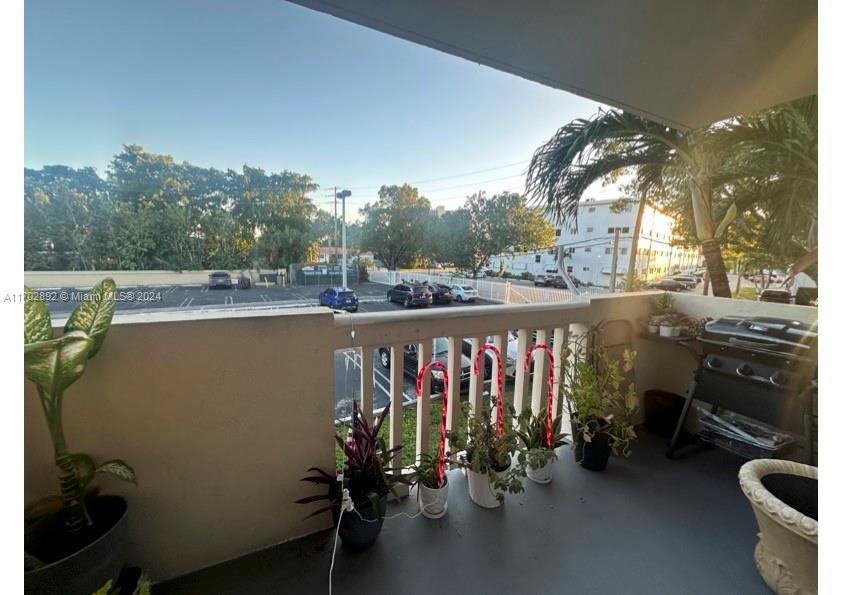 1800 Sans Souci Boulevard, Unit 239 North Miami, FL 33181 - Photo 7 of 15 a view of balcony and patio