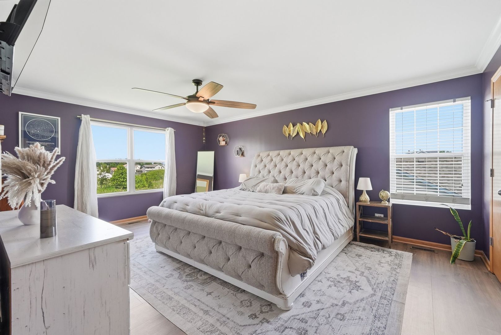 25216 Spring Street Manhattan, IL 60442 - Photo 9 of 28 a bedroom with a large bed and a desk