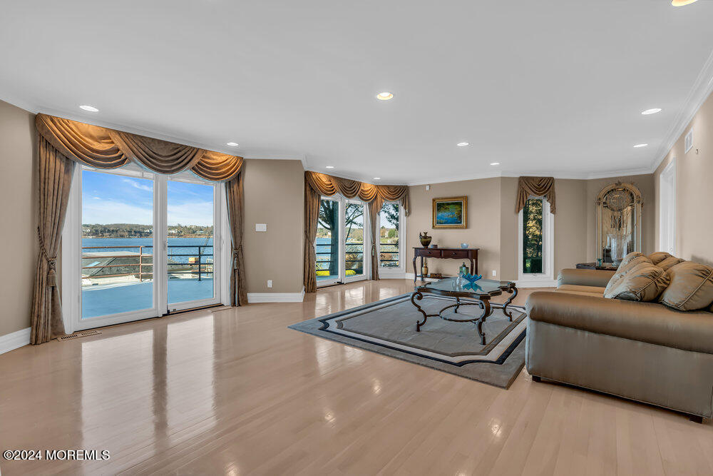 30 Alston Court Red Bank, NJ 07701 - Photo 17 of 103 a living room with furniture and large windows