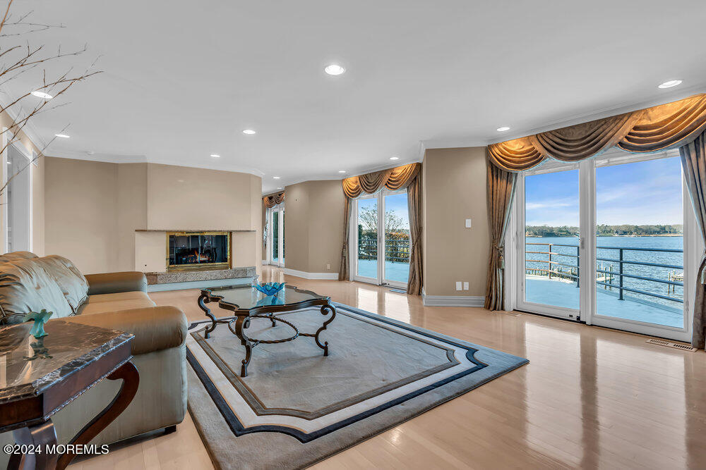 30 Alston Court Red Bank, NJ 07701 - Photo 18 of 103 a living room with furniture flat screen tv and a large window