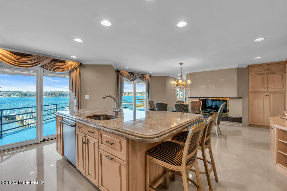 30 Alston Court Red Bank, NJ 07701 - Photo 22 of 103 Kitchen with a river view and fireplace