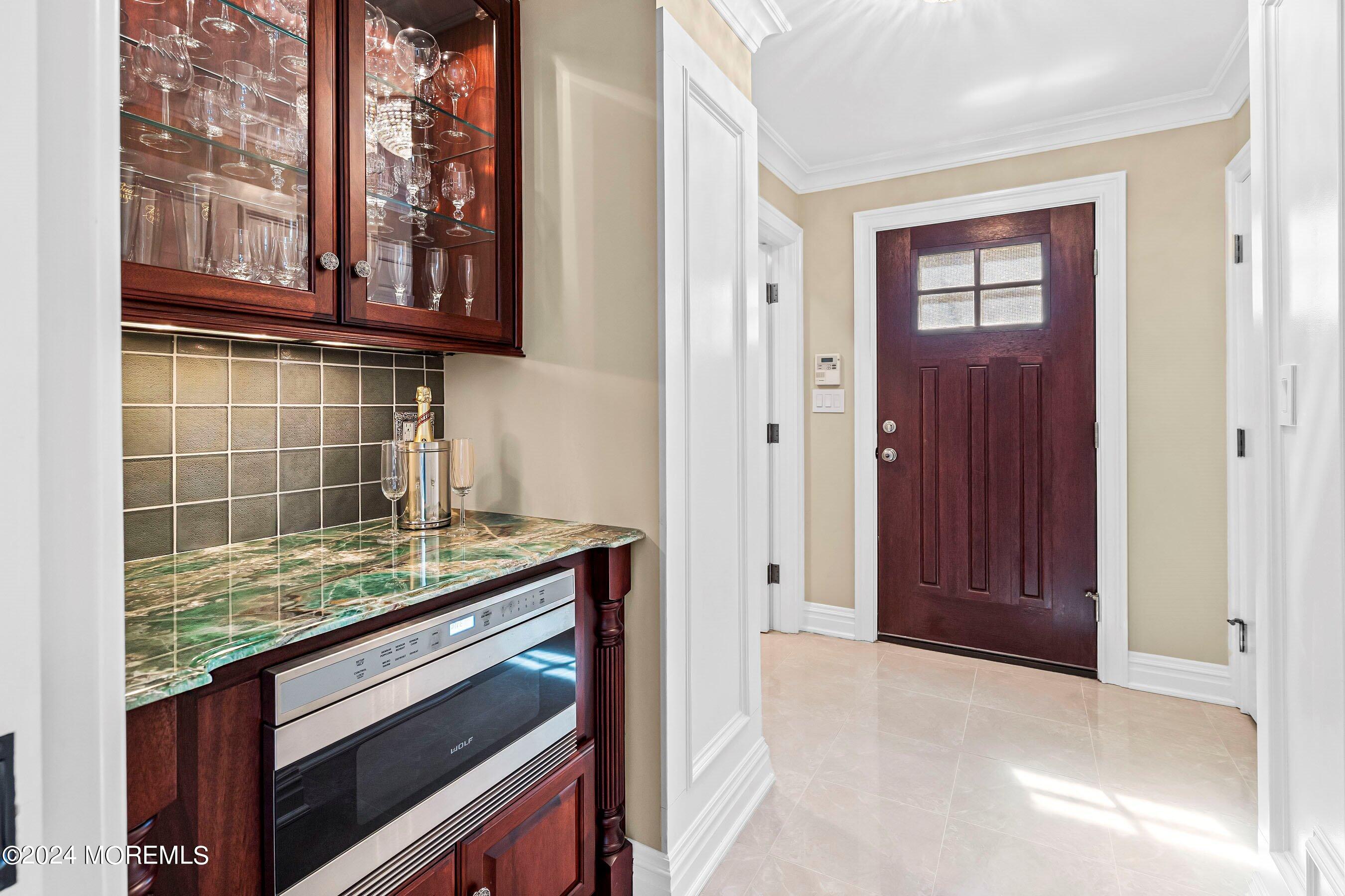 30 Alston Court Red Bank, NJ 07701 - Photo 29 of 103 a kitchen with stainless steel appliances granite countertop a stove and a microwave
