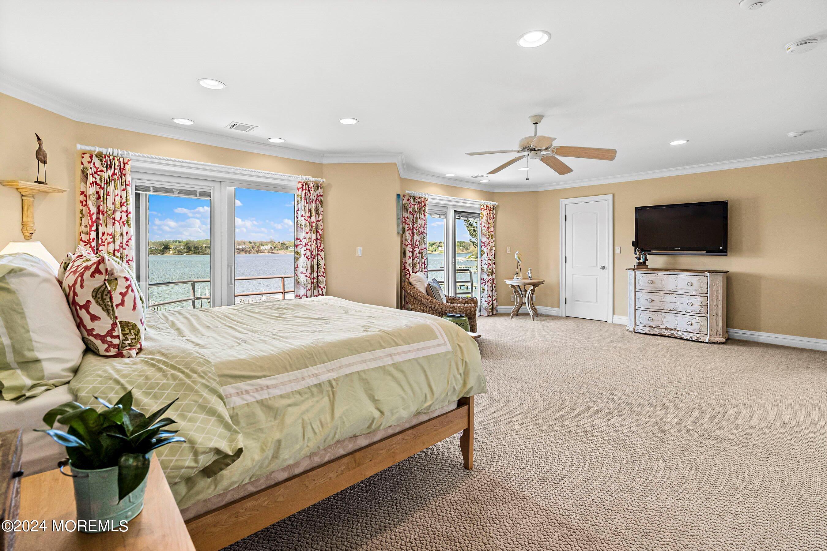 30 Alston Court Red Bank, NJ 07701 - Photo 46 of 103 a spacious bedroom with a bed and a flat screen tv