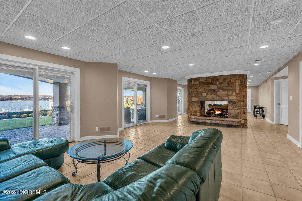 30 Alston Court Red Bank, NJ 07701 - Photo 63 of 103 a living room with furniture and a fireplace