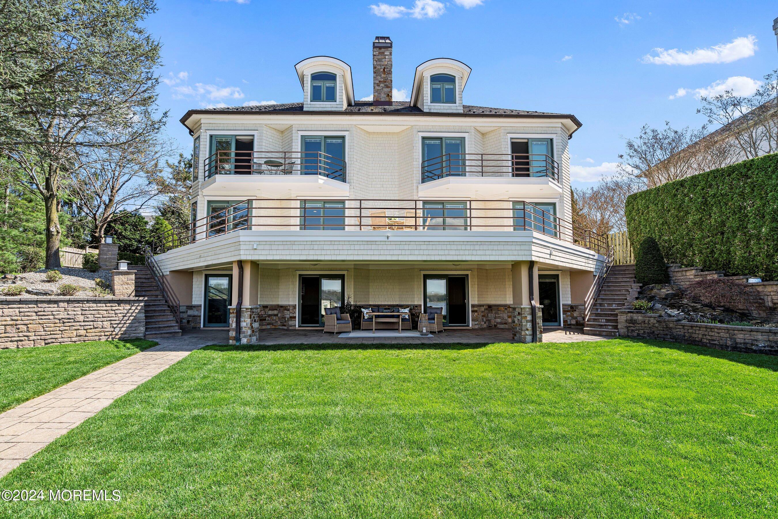 30 Alston Court Red Bank, NJ 07701 - Photo 71 of 103 a front view of house with yard and outdoor seating