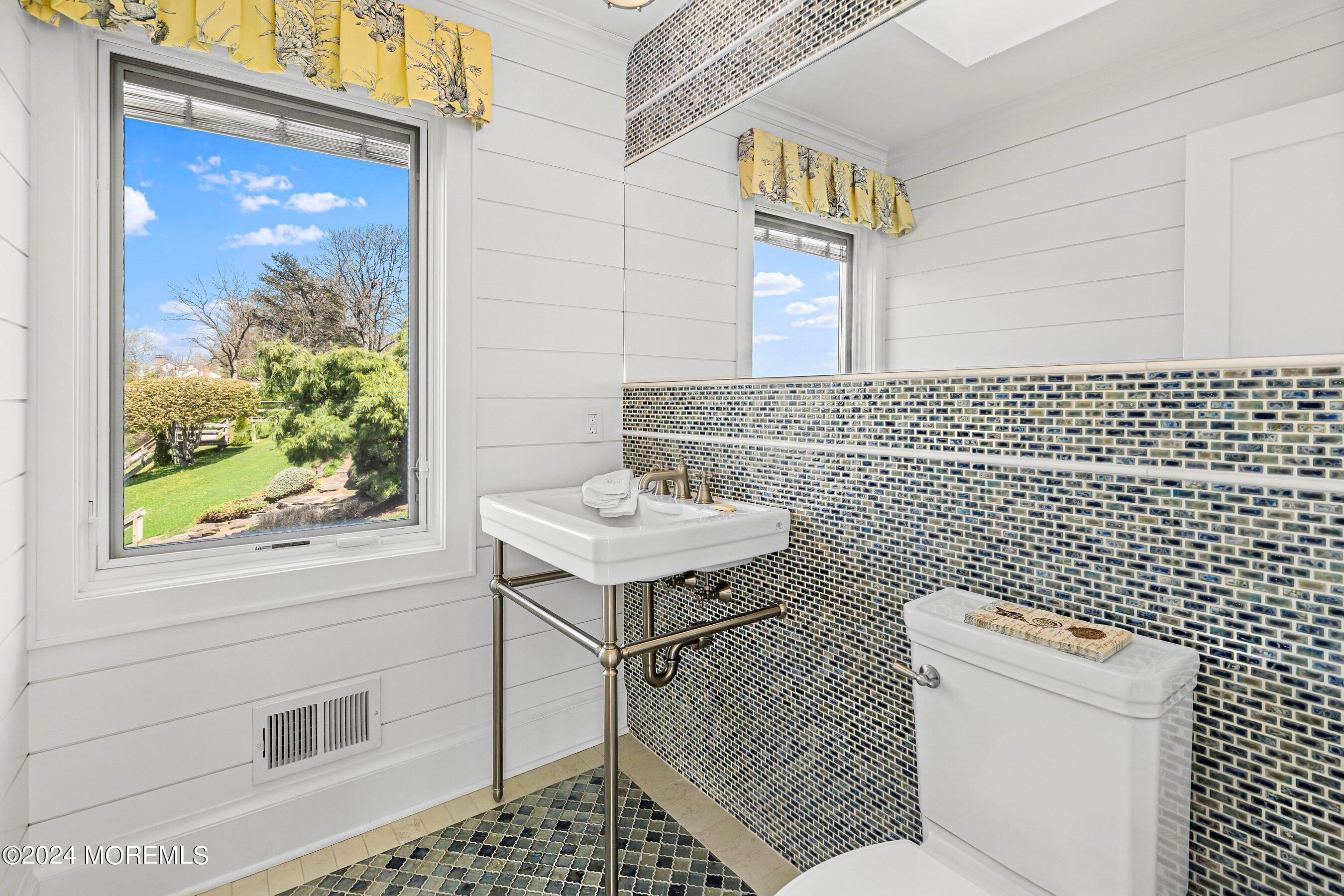 30 Alston Court Red Bank, NJ 07701 - Photo 84 of 103 a bathroom with a sink a toilet and a mirror