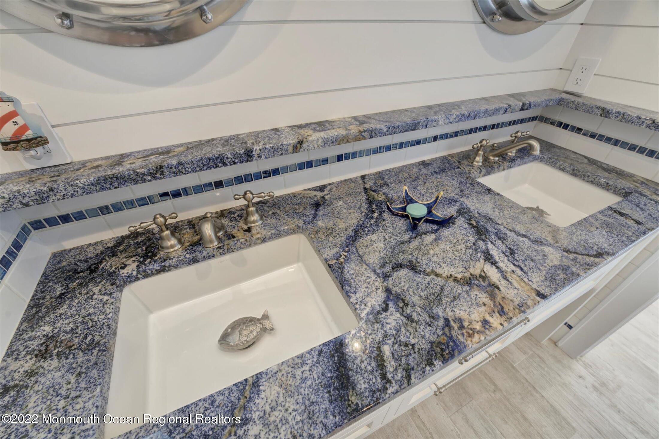 30 Alston Court Red Bank, NJ 07701 - Photo 88 of 103 a bathroom with a granite countertop sink and a mirror