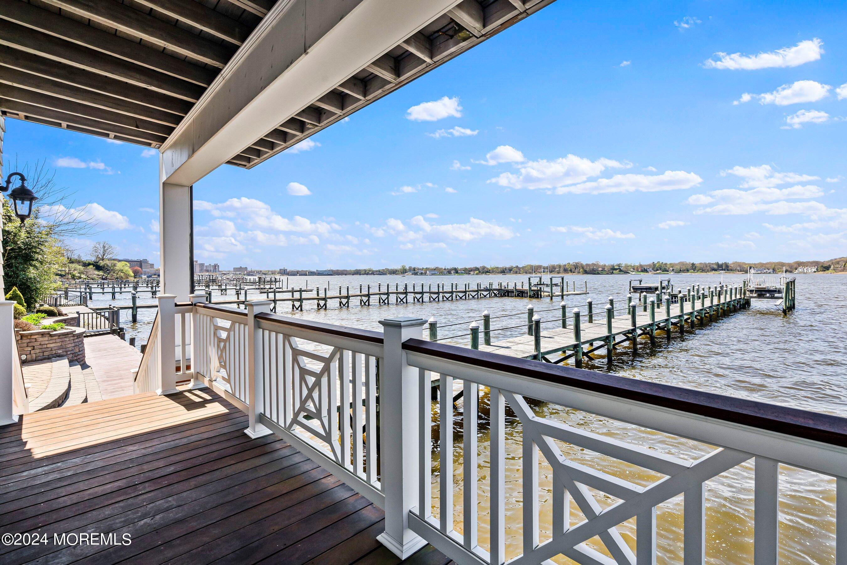 30 Alston Court Red Bank, NJ 07701 - Photo 93 of 103 a view of a balcony with wooden chairs