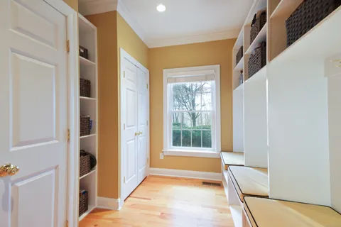 a view of front door and bedroom