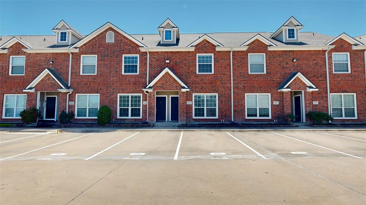1198 Jones-Butler Road, Unit 2603 College Station, TX 77840 - Photo 1 of 29 a front view of a house with a yard