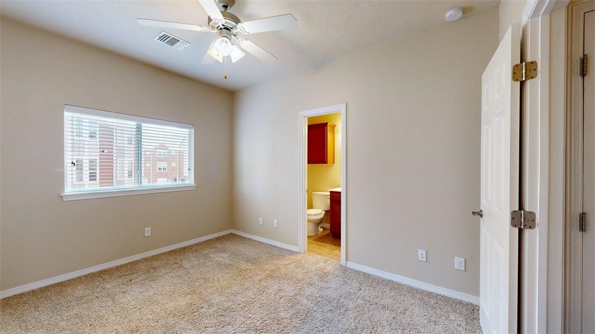 1198 Jones-Butler Road, Unit 2603 College Station, TX 77840 - Photo 15 of 29 a view of an empty room with a window
