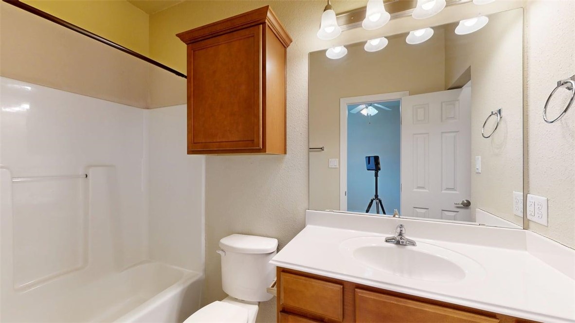 1198 Jones-Butler Road, Unit 2603 College Station, TX 77840 - Photo 17 of 29 a bathroom with a sink a toilet and shower