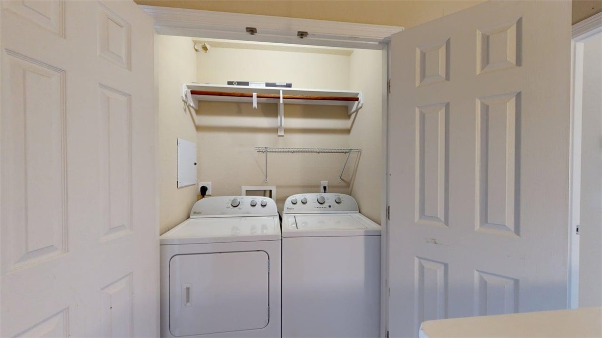 1198 Jones-Butler Road, Unit 2603 College Station, TX 77840 - Photo 25 of 29 a utility room with dryer and washer